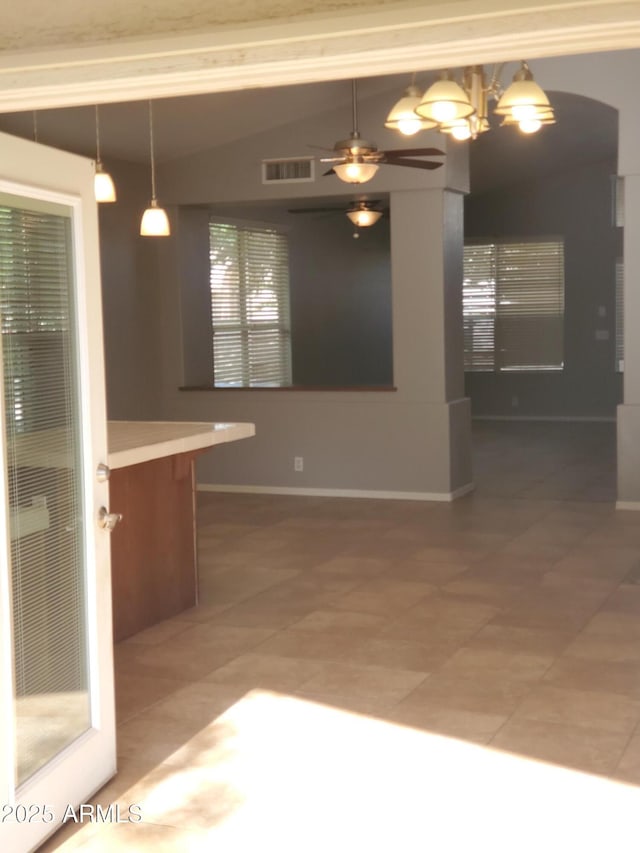 351 S Apache Dr, Chandler, AZ 85224 - unfurnished dining area featuring ceiling fan, tile patterned flooring, baseboards, and arched walkways
