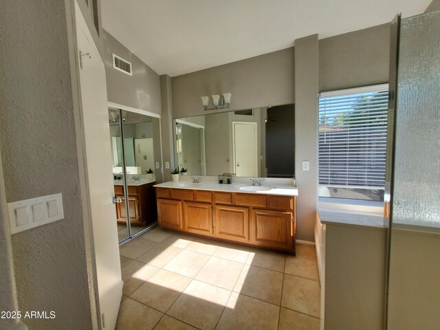 351 S Apache Dr, Chandler, AZ 85224 - bathroom featuring double vanity, tile patterned flooring, and a textured wall
