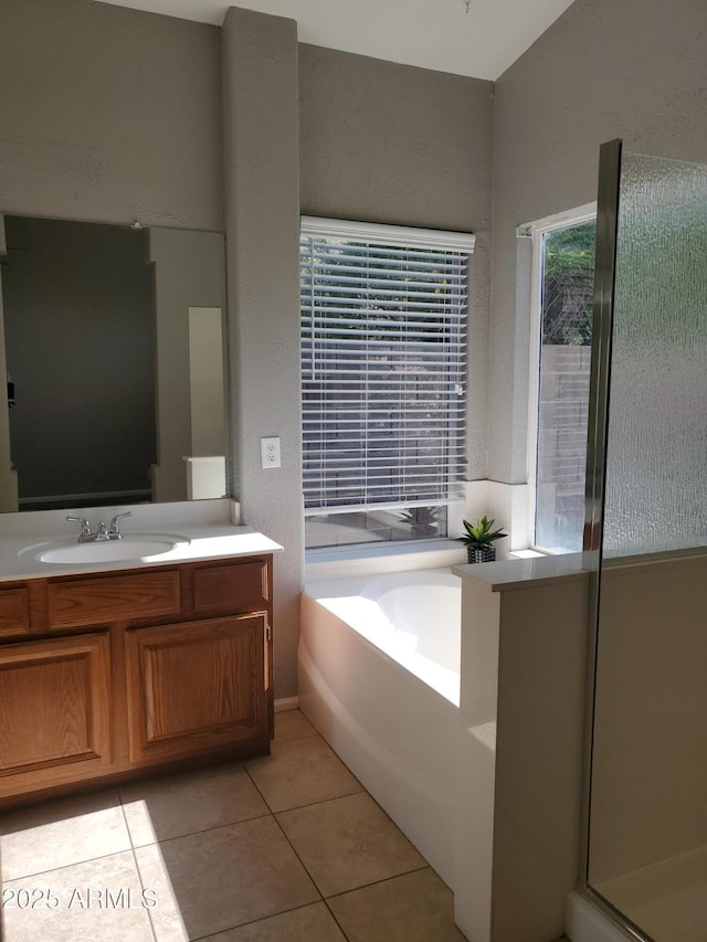 351 S Apache Dr, Chandler, AZ 85224 - bathroom with vanity, a bath, tile patterned flooring, and an enclosed shower