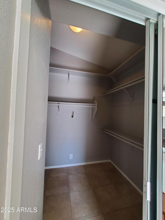 351 S Apache Dr, Chandler, AZ 85224 - walk in closet featuring tile patterned flooring and vaulted ceiling