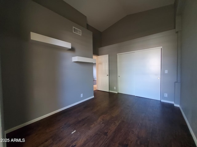 351 S Apache Dr, Chandler, AZ 85224 - unfurnished bedroom featuring lofted ceiling, dark wood-type flooring, and baseboards