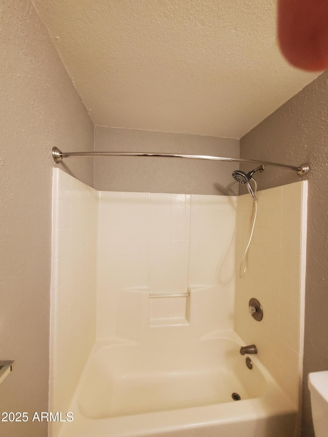 351 S Apache Dr, Chandler, AZ 85224 - bathroom featuring a textured ceiling, a textured wall, toilet, and shower / tub combination