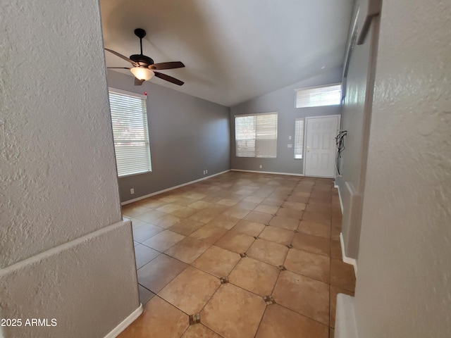 351 S Apache Dr, Chandler, AZ 85224 - entrance foyer featuring vaulted ceiling, a textured wall, light tile patterned flooring, and a ceiling fan