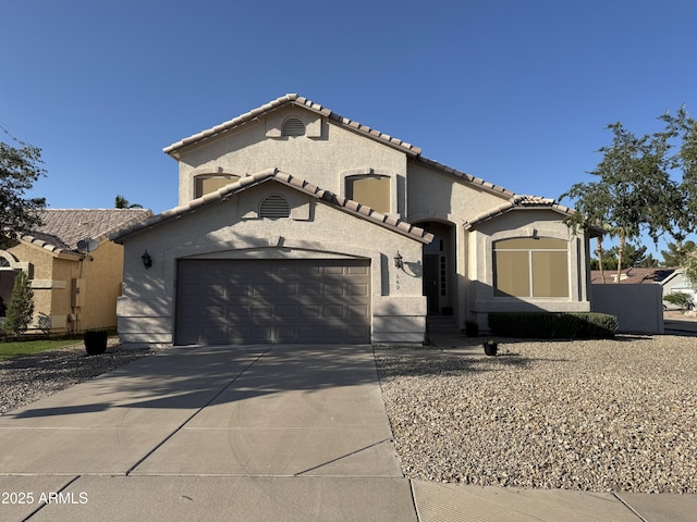 640 W Country Estates Ave, Gilbert, AZ 85233 - mediterranean / spanish-style home featuring an attached garage, driveway, stucco siding, and a tile roof