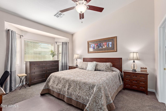 carpeted bedroom with ceiling fan and lofted ceiling