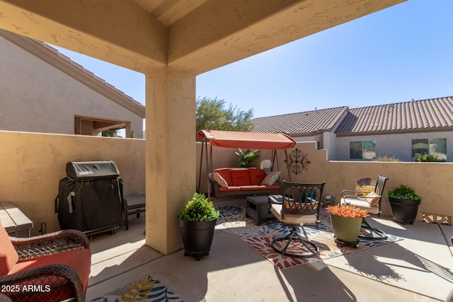 view of patio / terrace with an outdoor living space and area for grilling