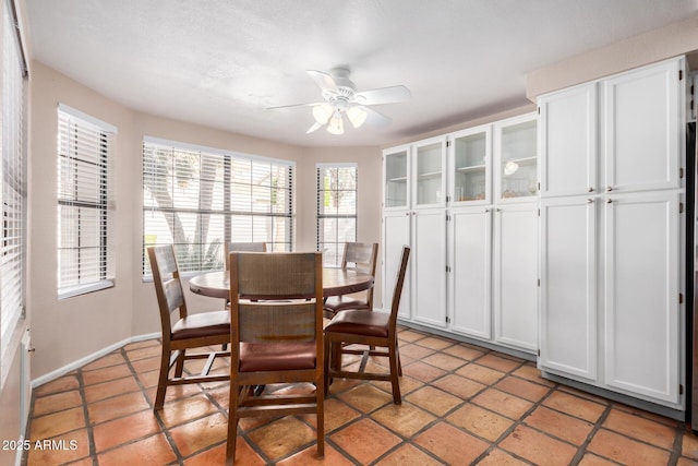 6118 E Star Valley St, Mesa, AZ 85215 - dining space featuring a ceiling fan and baseboards