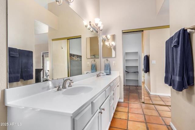 6118 E Star Valley St, Mesa, AZ 85215 - full bath featuring baseboards, double vanity, a sink, and tile patterned floors