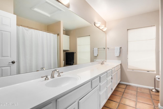 6118 E Star Valley St, Mesa, AZ 85215 - full bath featuring tile patterned flooring, a sink, baseboards, and double vanity