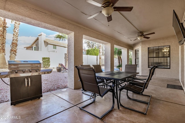 6118 E Star Valley St, Mesa, AZ 85215 - view of patio with ceiling fan, a grill, outdoor dining area, and a fenced backyard