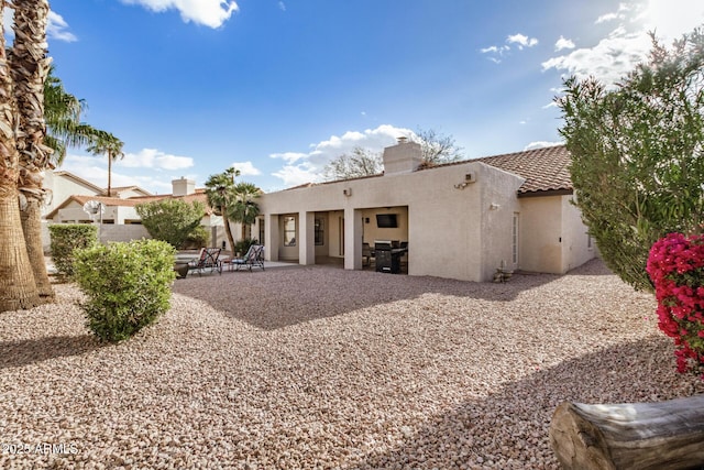 6118 E Star Valley St, Mesa, AZ 85215 - back of property featuring a patio area, a tile roof, and stucco siding
