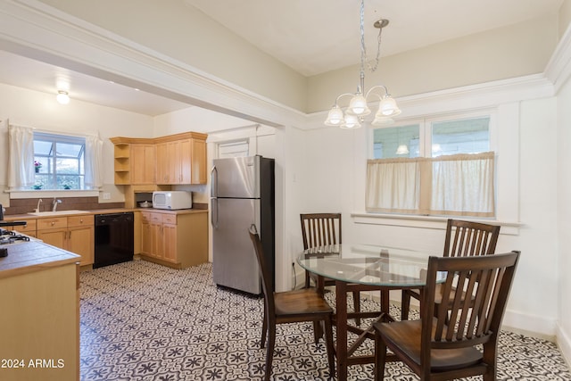 kitchen with a sink, open shelves, black dishwasher, freestanding refrigerator, and white microwave