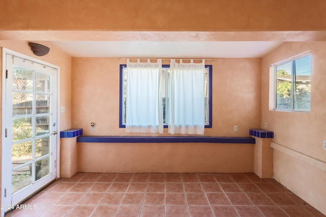 interior space featuring tile patterned flooring