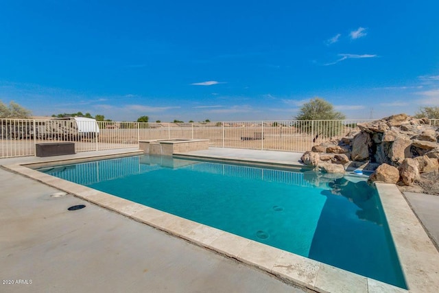 1101 S 4th St, Avondale, AZ 85323 - view of swimming pool featuring a pool with connected hot tub