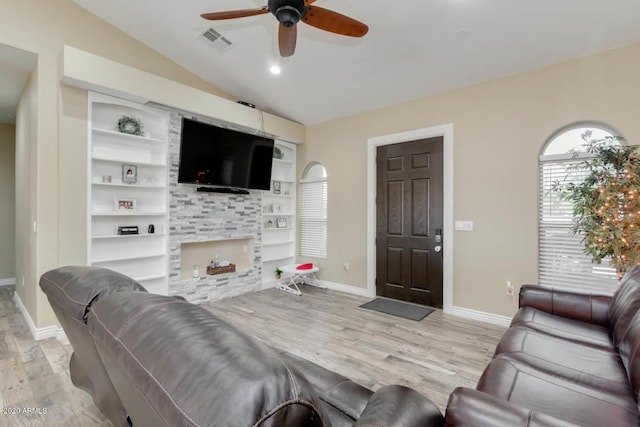 1101 S 4th St, Avondale, AZ 85323 - living area with ceiling fan, light wood finished floors, vaulted ceiling, and built in features