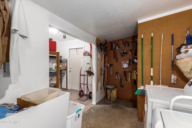 interior space with washer / clothes dryer and a workshop area