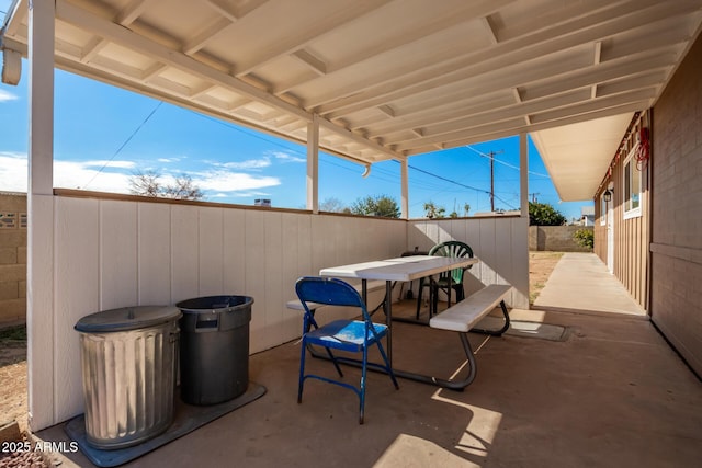 view of patio / terrace with a fenced backyard and outdoor dining area