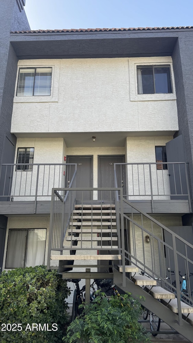 view of building exterior featuring stairs