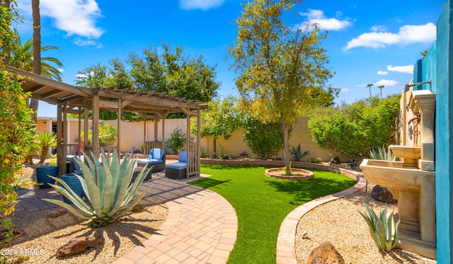 view of yard featuring outdoor lounge area, a patio, and a pergola