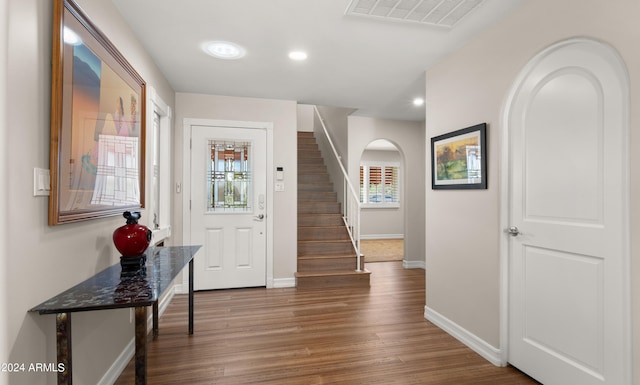 entrance foyer featuring hardwood / wood-style floors