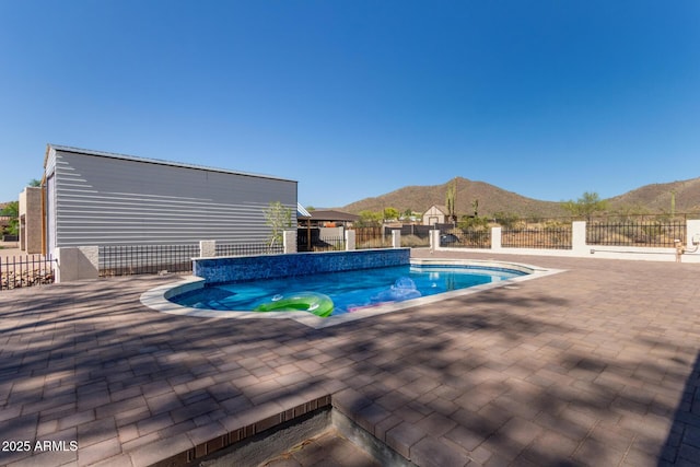 1024 E Saddle Mountain Rd, Phoenix, AZ 85086 - view of swimming pool featuring a mountain view and a patio area
