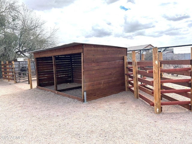 view of outbuilding featuring an outbuilding and an exterior structure