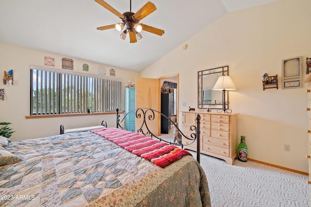 carpeted bedroom with vaulted ceiling, a spacious closet, a closet, and ceiling fan