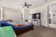 bedroom featuring carpet floors and a ceiling fan