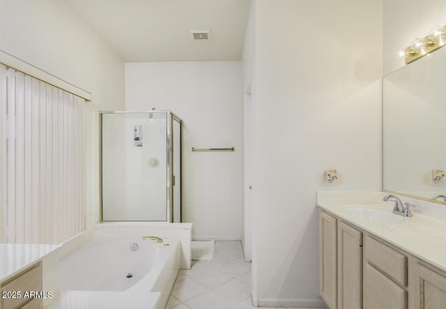 full bath with visible vents, tile patterned floors, a stall shower, a bath, and vanity