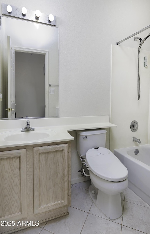 full bathroom featuring bathing tub / shower combination, toilet, vanity, and tile patterned flooring