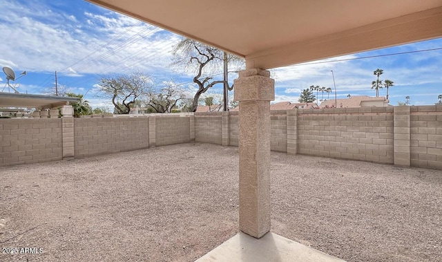 view of yard featuring a patio and a fenced backyard