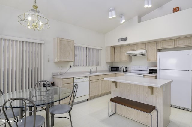 kitchen with white appliances, light brown cabinets, visible vents, a sink, and under cabinet range hood