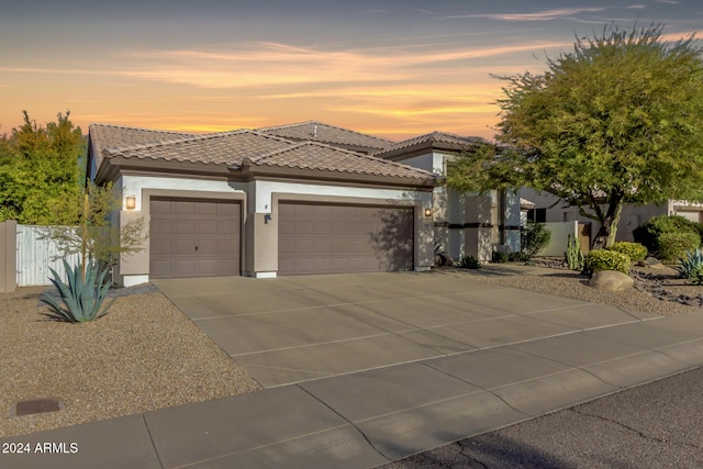 view of front of property featuring a garage