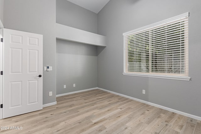 unfurnished room featuring light hardwood / wood-style flooring