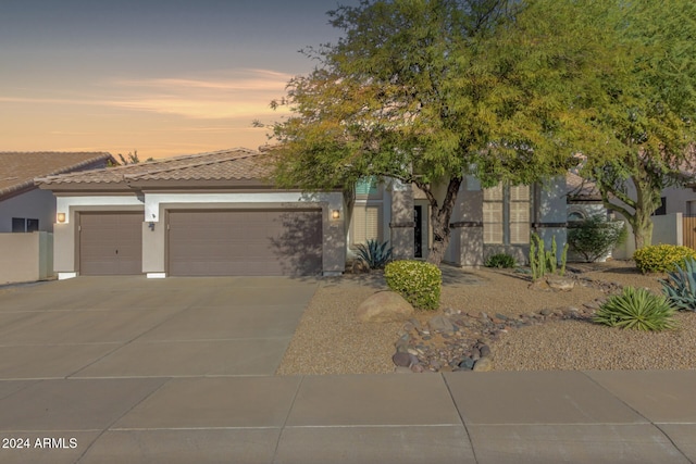 view of front of property featuring a garage