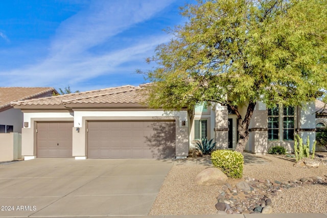 view of front of property featuring a garage