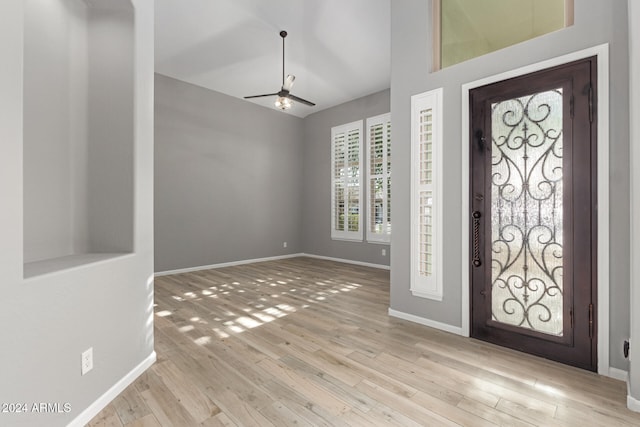 entrance foyer with ceiling fan and light hardwood / wood-style floors