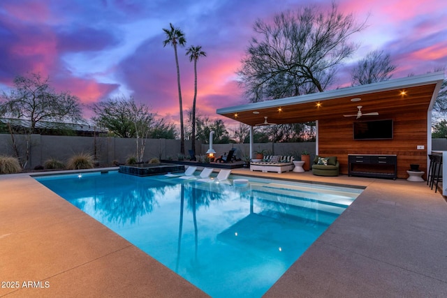 view of pool featuring a patio area and ceiling fan