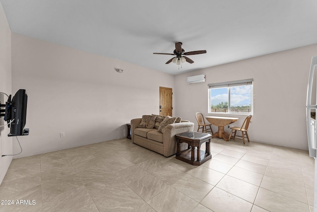 tiled living room featuring a wall unit AC and ceiling fan