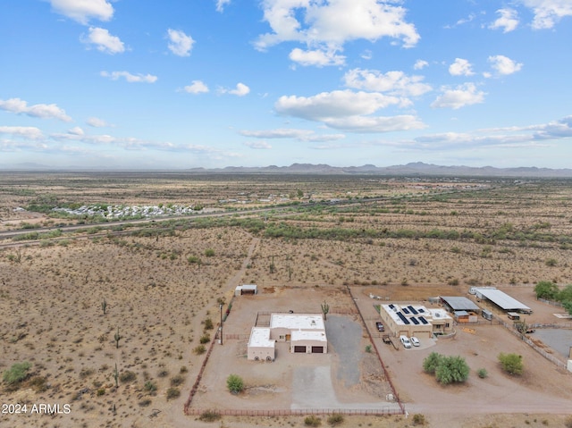 birds eye view of property with a rural view