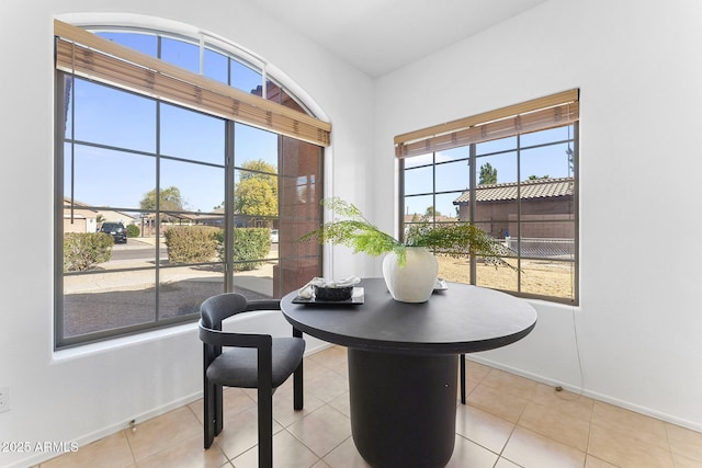 dining room with light tile patterned flooring