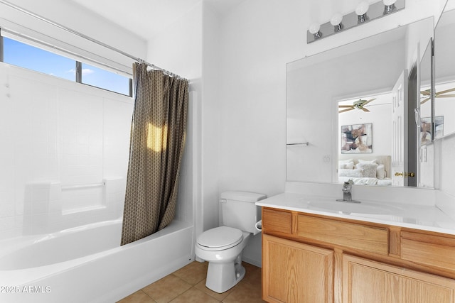 full bathroom with shower / tub combo with curtain, tile patterned floors, toilet, and vanity