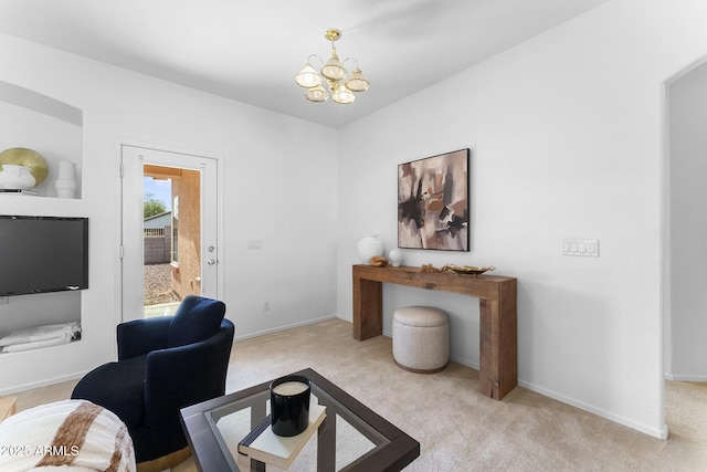 carpeted office space featuring a notable chandelier