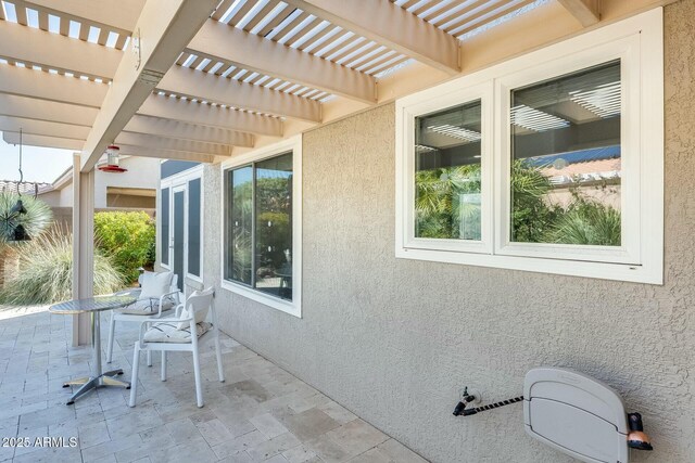 view of patio / terrace featuring a pergola