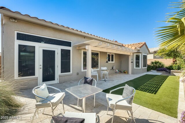 view of patio featuring a pergola and fence