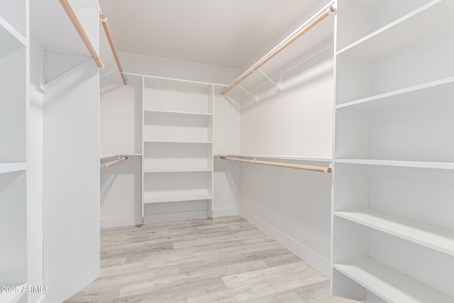 13012 N 36th Dr, Phoenix, AZ 85029 - walk in closet with wood finished floors