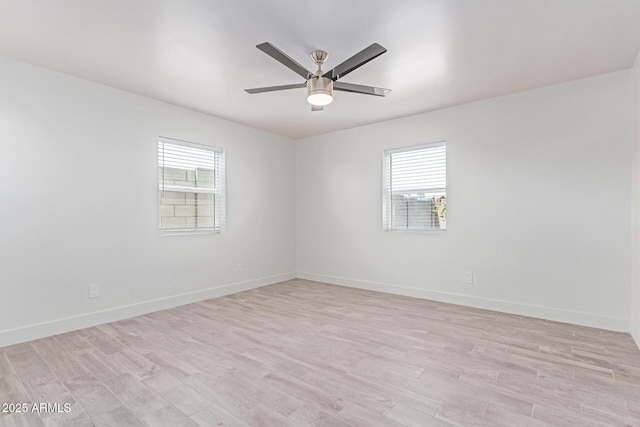 13012 N 36th Dr, Phoenix, AZ 85029 - empty room featuring light wood-style floors and ceiling fan