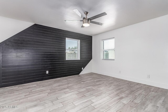 13012 N 36th Dr, Phoenix, AZ 85029 - spare room featuring wood finished floors and a ceiling fan