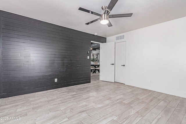 13012 N 36th Dr, Phoenix, AZ 85029 - unfurnished room with ceiling fan and wood finished floors