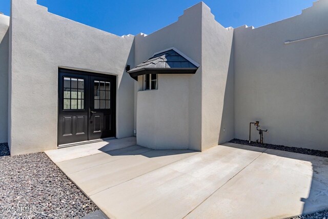 13012 N 36th Dr, Phoenix, AZ 85029 - entrance to property with french doors and stucco siding